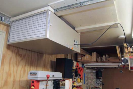 air filter while it’s located centrally, Dubé fastened it to heavy-duty drawer slides. It