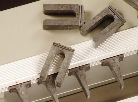 Akeda: Guide fingers snap into indexed guide rail