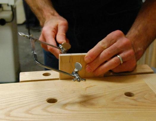 Cut out the sockets with a fret or coping saw