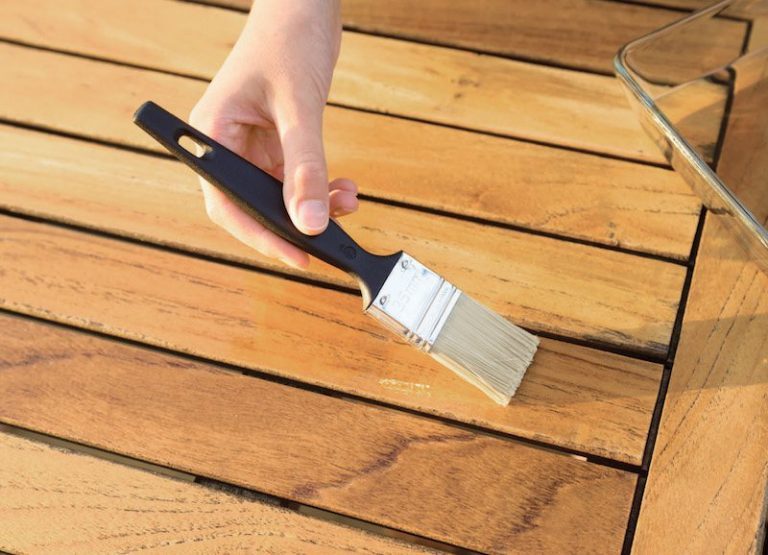 Brushes for applying a finish