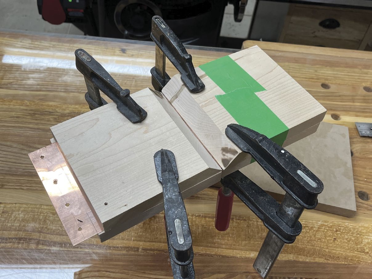 wood and copper lantern